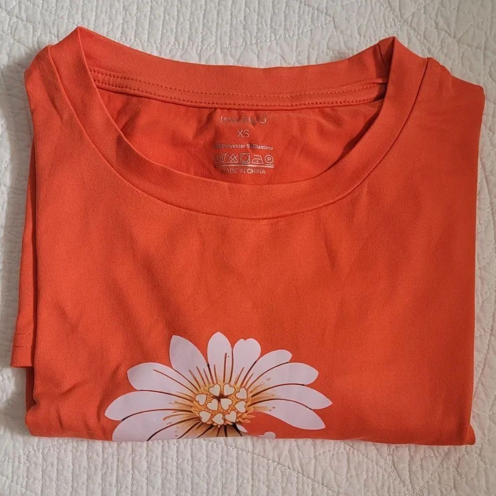 Vibrant Coral Short Sleeve Tee with Floral Design - Picture 8 of 9